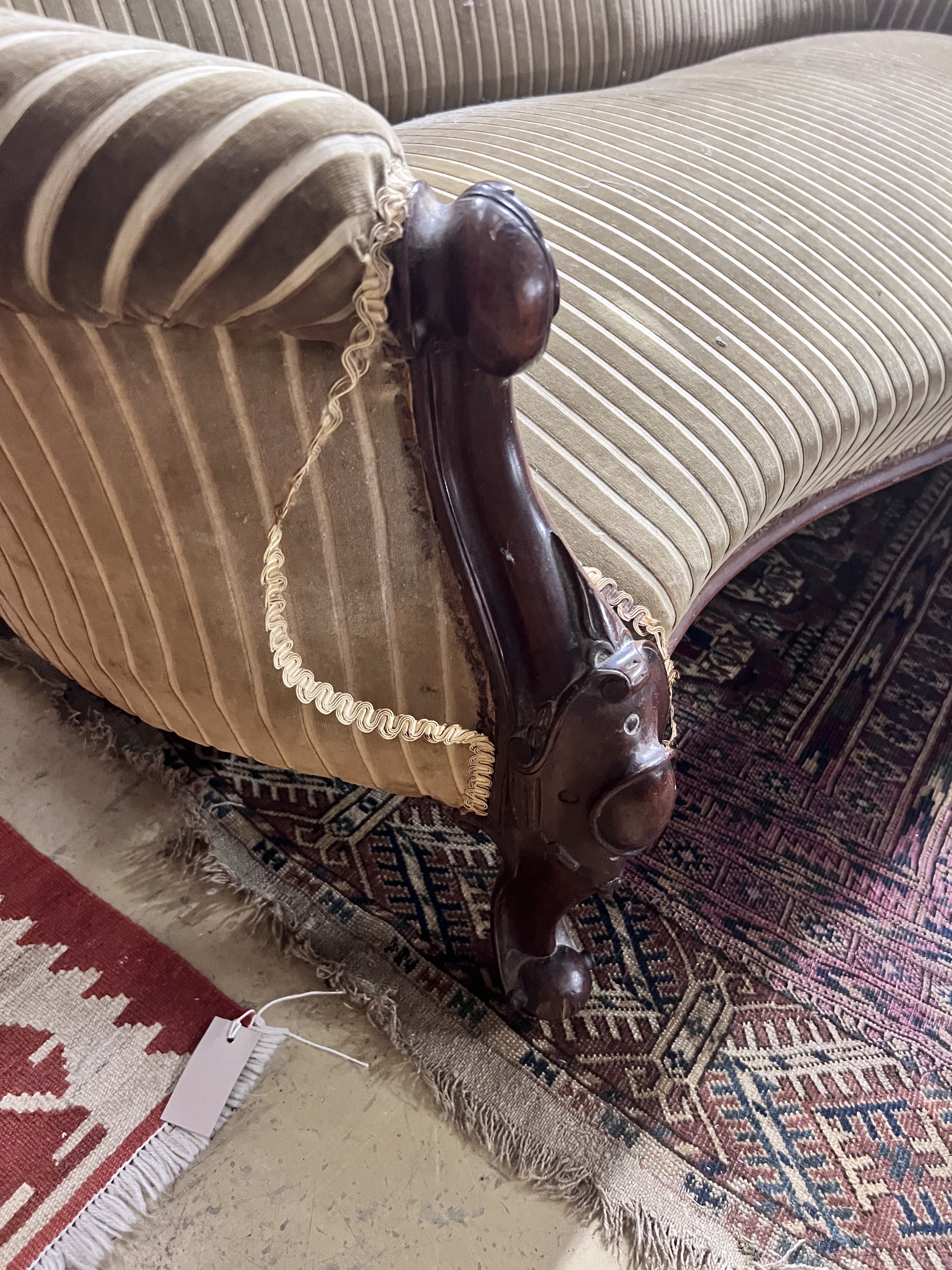 A Victorian carved mahogany settee, length 190cm, width 74cm, height 93cm